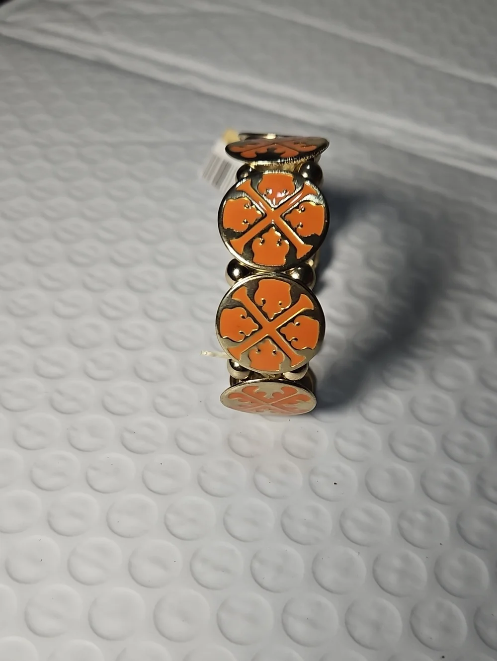 Tory Burch Gold-Tone Bracelet with Coral Orange Enamel Clover Motifs